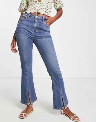Urban Revivo flare jeans with front slit in mid blue