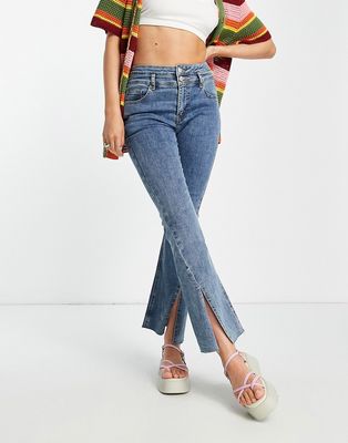 Urban Revivo flare jeans with raw hem in light blue