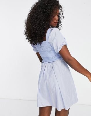 Urban Revivo mini smock dress with full skirt and knitted layer in blue