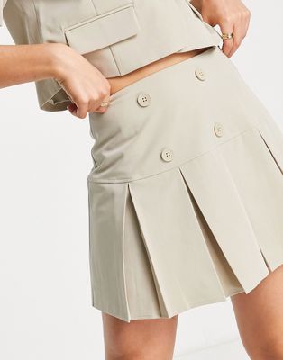 Urban Revivo mini tailored pleated skirt with buttons in khaki - part of a set-Green