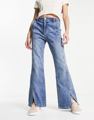 Urban Revivo seam detail split front flared jeans in blue