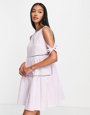 Urban Threads tie back tiered mini dress in lilac-Purple