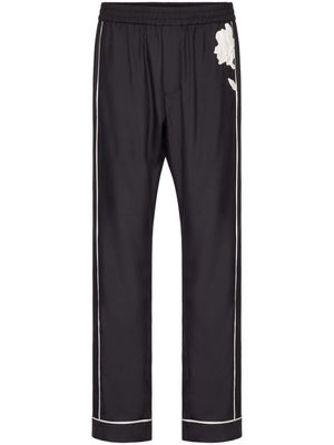 Valentino Garavani flower-appliqué silk pajama trousers - Black