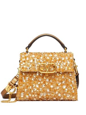 Valentino Garavani mini VSLING embellished handbag - Gold