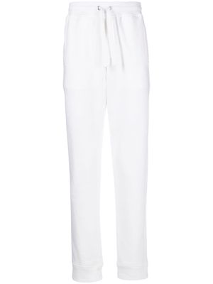 Valentino Garavani Rockstud-embellished cotton track pants - White