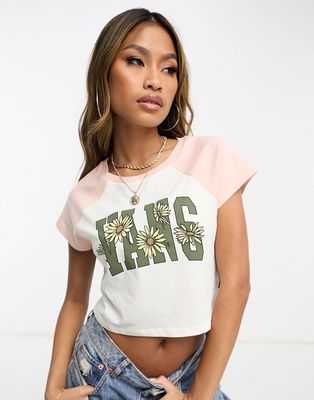 Vans daisy logo print cropped t-shirt in baby pink and white