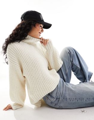 Vero Moda high neck long sleeve knit sweater in cream-White