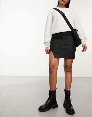 Vero Moda wrap front coated mini skirt in black
