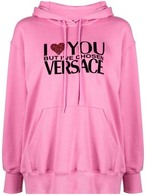 Versace crystal-embellished slogan hoodie - Pink