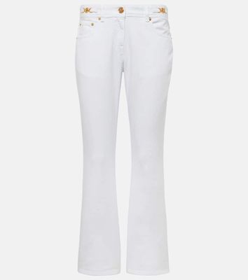 Versace Embellished low-rise flared jeans