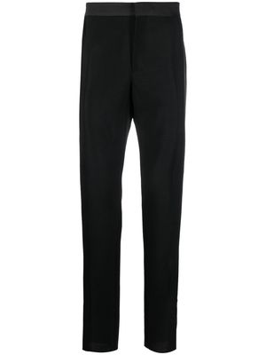 Versace embroidered-logo slim-fit trousers - Black