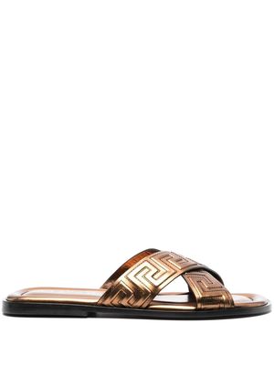 Versace Greca-embossed crossover-strap sandals - Gold