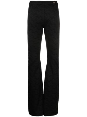 Versace Greca-knit flared trousers - Black
