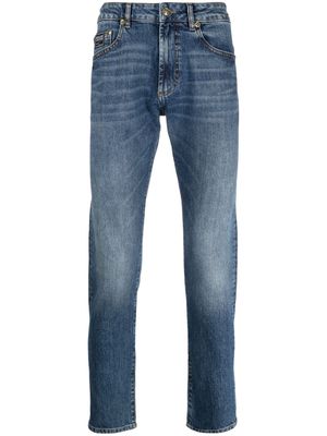 Versace Jeans Couture logo-appliqué slim-cut jeans - Blue