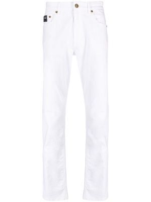 Versace Jeans Couture logo-patch slim-cut jeans - White