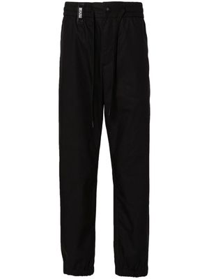 Versace Jeans Couture logo-strap tapered-leg trousers - Black