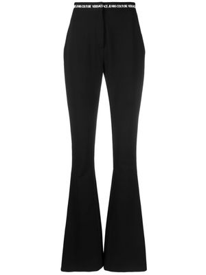 Versace Jeans Couture logo-waistband flared trousers - Black