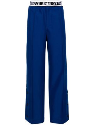 Versace Jeans Couture logo-waistband pleated wide-leg trousers - Blue