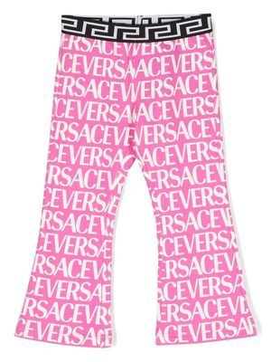 Versace Kids all-over logo print trousers - Pink