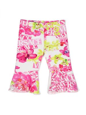 Versace Kids flared floral-print trousers - Pink