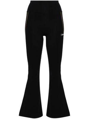 Versace logo-appliqué flared leggings - Black