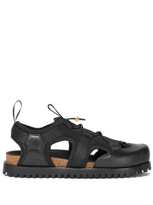 Versace logo-debossed caged sandals - Black