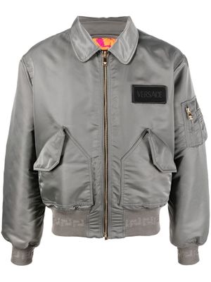 Versace logo-patch bomber jacket - Grey