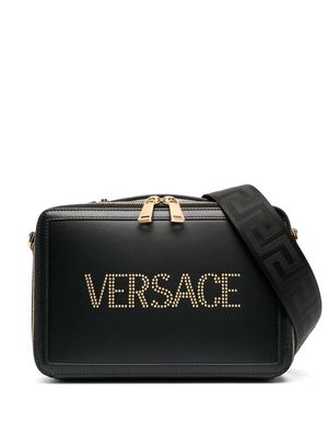 Versace logo stud-embellished leather messenger bag - Black