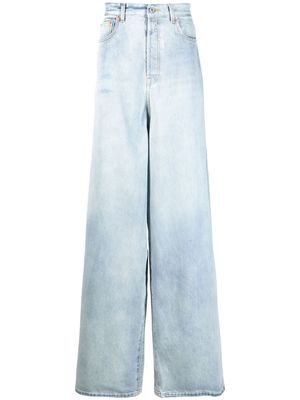 VETEMENTS bleached-effect wide-leg jeans - Blue