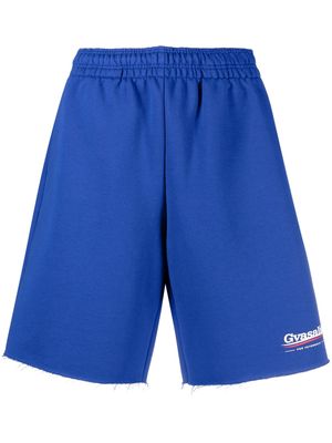 VETEMENTS knee-length track shorts - Blue