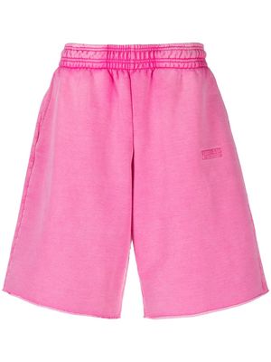 VETEMENTS logo-embroidered wide-leg shorts - Pink