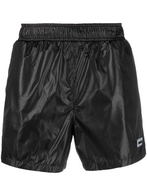 VETEMENTS logo patch swim shorts - Black