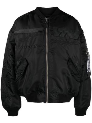 VETEMENTS logo-patch zip-up bomber jacket - Black