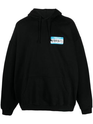 VETEMENTS Name-tag printed hoodie - Black
