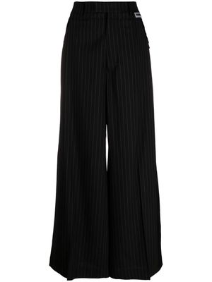 VETEMENTS pinstripe wide-leg trousers - Black
