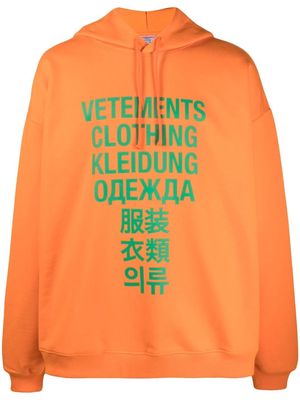 VETEMENTS Translation logo-print hoodie - Orange