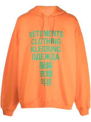 VETEMENTS translation-print hoodie - Orange