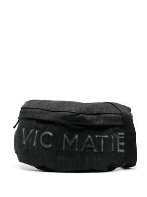 Vic Matie logo-embossed denim belt bag - Black