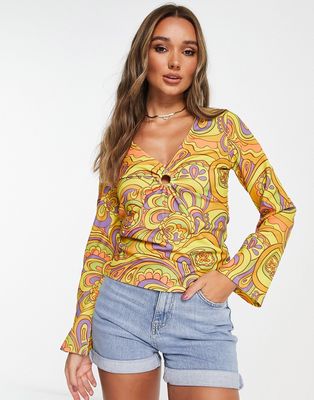 Vila ring detail top with flared sleeves in 60s retro print-Multi