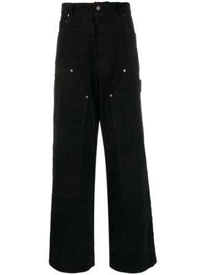 We11done eyelet-detail panelled bootcut trousers - Black