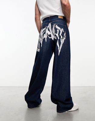 Weekday Astro loose fit wide leg jeans with graphic print in archaic blue