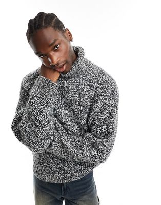Weekday Cypher wool blend oversized turtleneck sweater in black and white twist yarn
