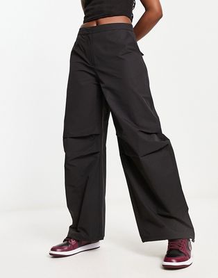 Weekday Nilo oversized tracksuit pants in black - part of a set