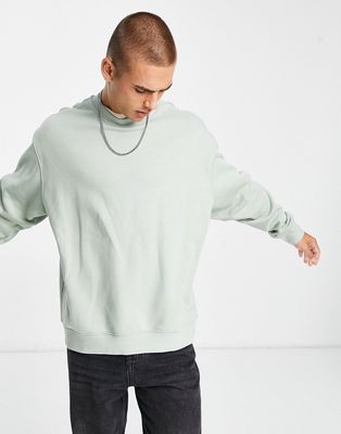 Weekday oversized sweatshirt in sage exclusive at ASOS-Green
