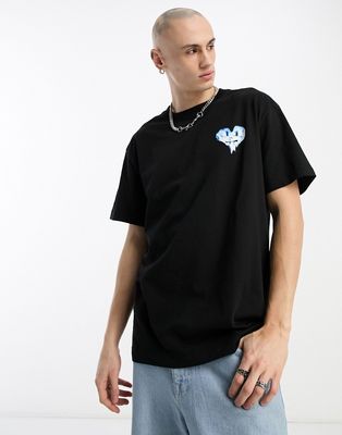 Weekday oversized t-shirt with angry heart graphic in black