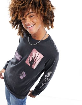 Weekday relaxed fit long sleeve T-shirt with graphic print patches in washed black