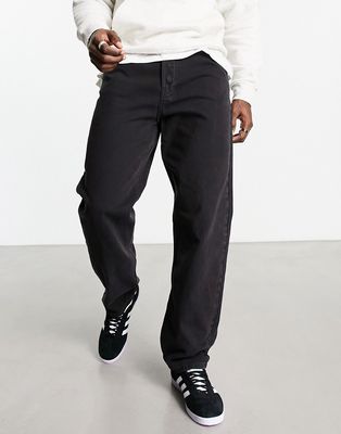 Weekday tape loose tapered jeans in black lux