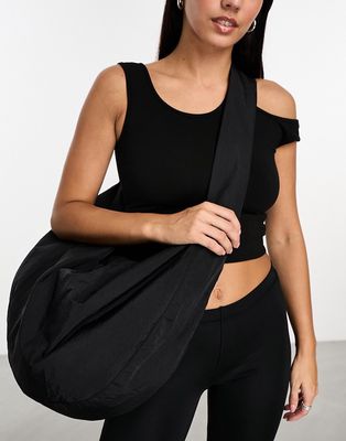 Weekday Unisex Samir slouchy shoulder bag in black