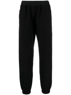 White Mountaineering ribbed track cotton-blend pants - Black
