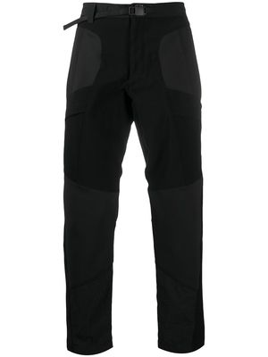 White Mountaineering slim-fit panelled trousers - Black